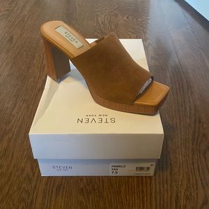 Platform heeled mule